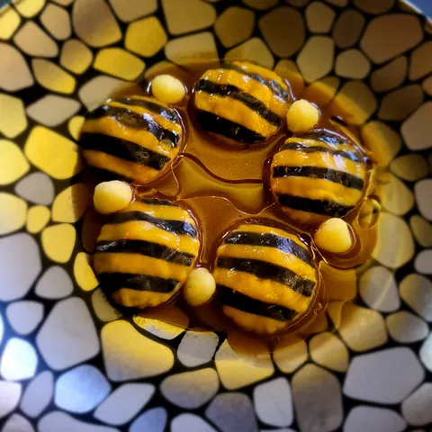 [I ate] Lobster ravioli in brodo &amp; local olive oil (the little white dots were some sort of piped cheese) Piran, Slovenia