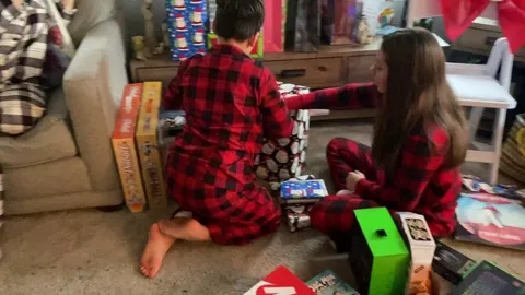 It was his turn to open the family gift this year and his response didn’t disappoint #PS5