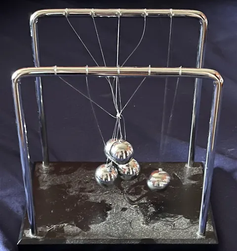 My cousin did this to my Newton’s cradle