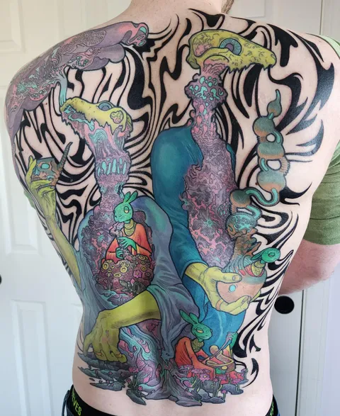 Back tattoo of some monsters by Eric Wettemann in Middletown CT