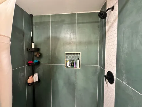 Turned my 1903 three car garage into 1/2 garage and 1/2 bedroom and bathroom my