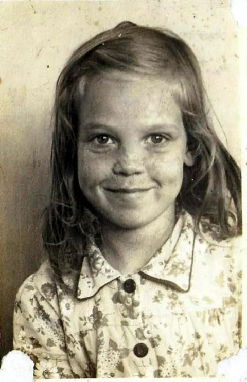 My mother, 8 years old, in 1944