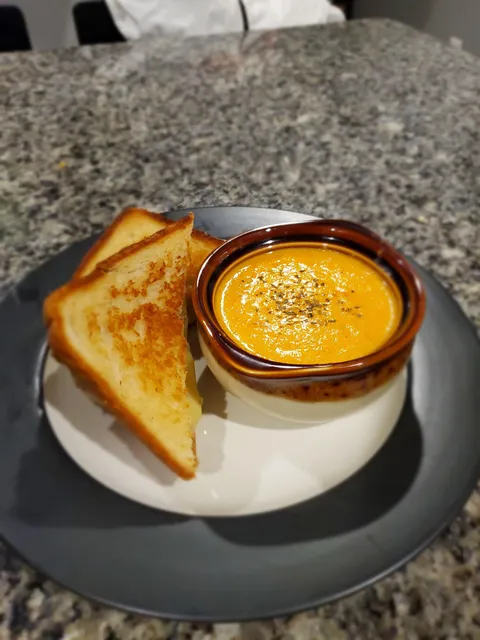 My wife's homemade tomatoe soup and grilled cheese. 