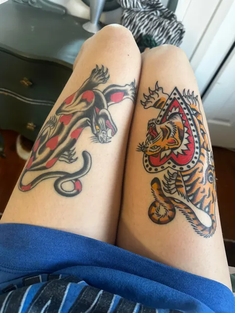 My thigh kitties! One fresh, one healed - done by Felipe Miranda in Portland OR