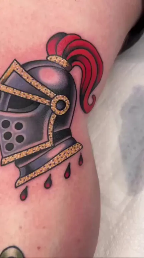 Butch at Kind Tattoo in nashville set me up with a knee cap piece. It's so stupid and I love it very much.