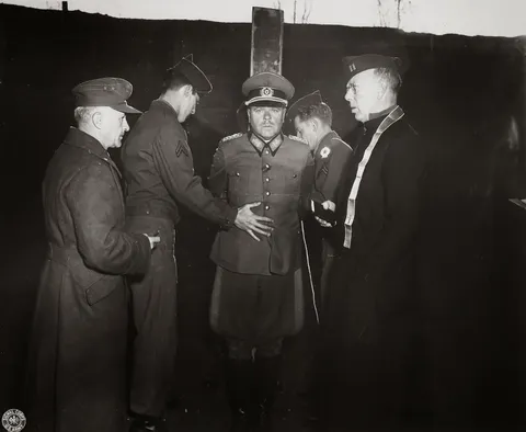 American troops prepare nazi Major General Anton Dostler for execution for killing 15 OSS men, Italy, 1945.