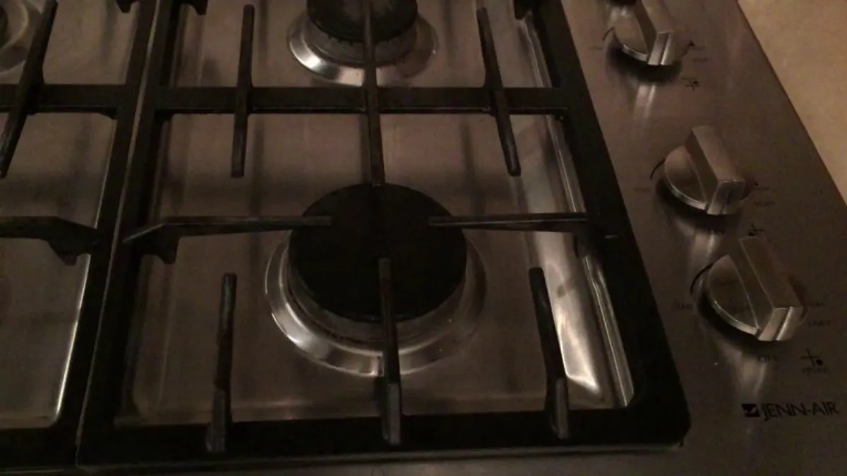 Bad burner? Don't grab a match, just flip a pan over.