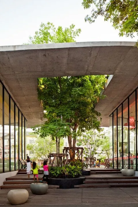 Practical implications of trees growing through a building?