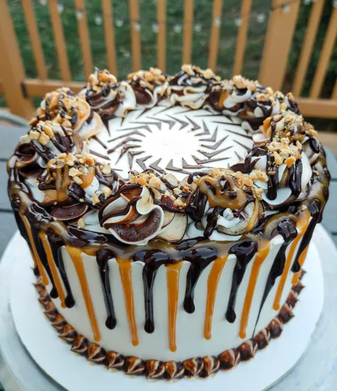 Made a snickers cake for my father in law's 70th birthday.