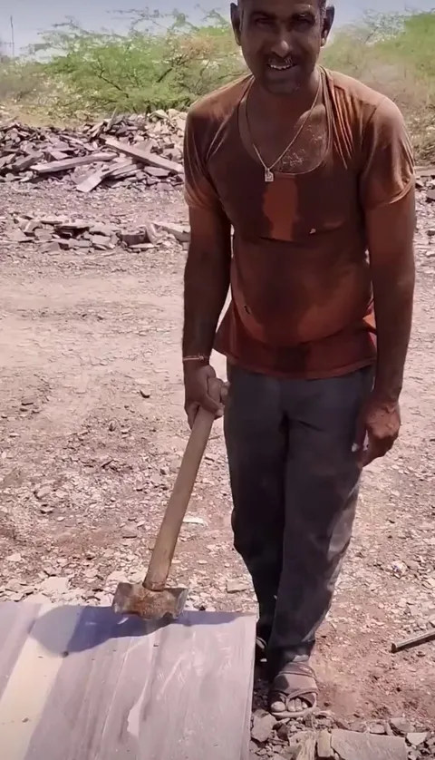 Traditional way of cutting stone slabs at a quarry (Rajasthan, India)