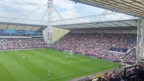 Liverpool and Preston fans join together with an applause and rendition of the Diogo Jota chant as the clock hit 20 minutes in their pre-season friendly at Deepdale