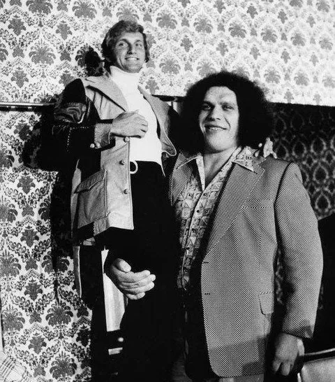Andre the Giant holding up NFL quarterback Joe Theismann, 1975