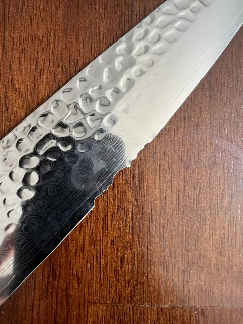 My $300 Handmade Japanese Knife I Brought Back from Kyoto, Used By My Mom to “Butcher Raw Chicken Bones”