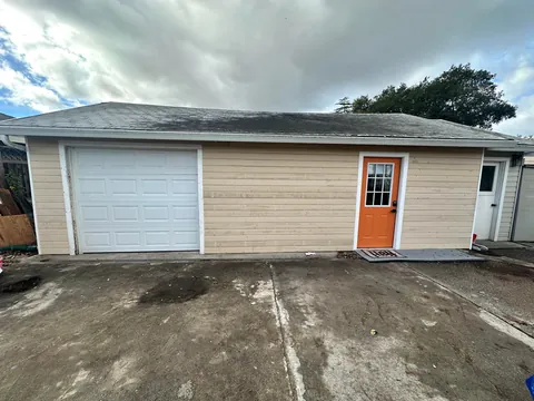 Turned my 1903 three car garage into 1/2 garage and 1/2 bedroom and bathroom my