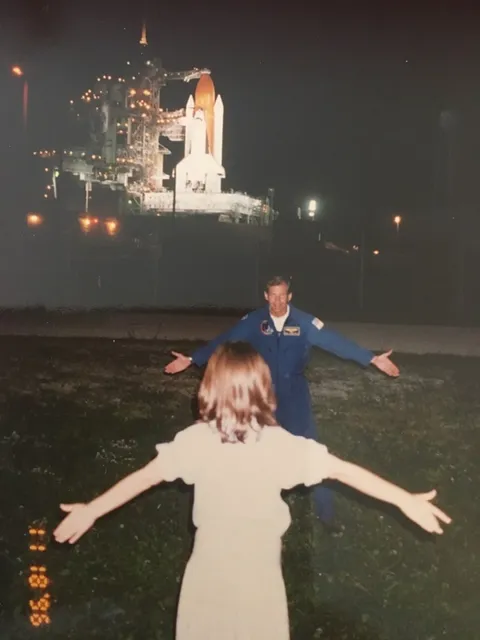 Before the launch of STS-80, I was allowed to "hug" my dad goodbye - not pictured, a ditch that separates families from the astronauts, as they have to be quarantined before spaceflight. Happy Father's Day, dad.