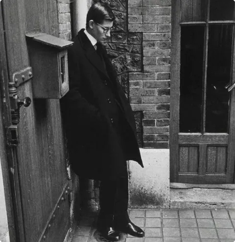 21 years old Yves Saint Laurent at Christian Dior’s funeral, 1957