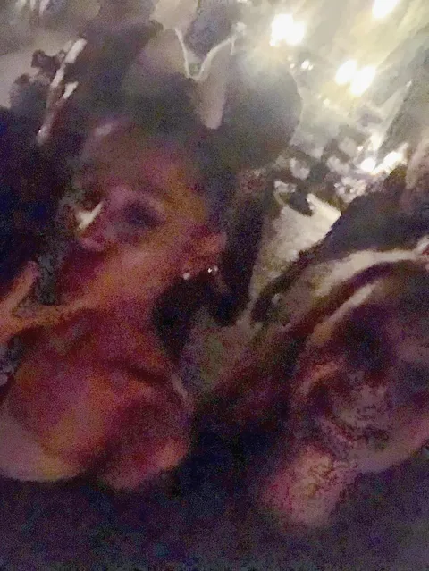 I met Ariana Grande at Disneyland in 2018. Got a picture, but forgot to turn the flash on. This is the pic already brightened
