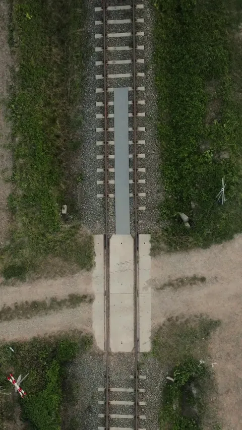 [Top-Down View] Dawid Godziek riding a bike on a moving train