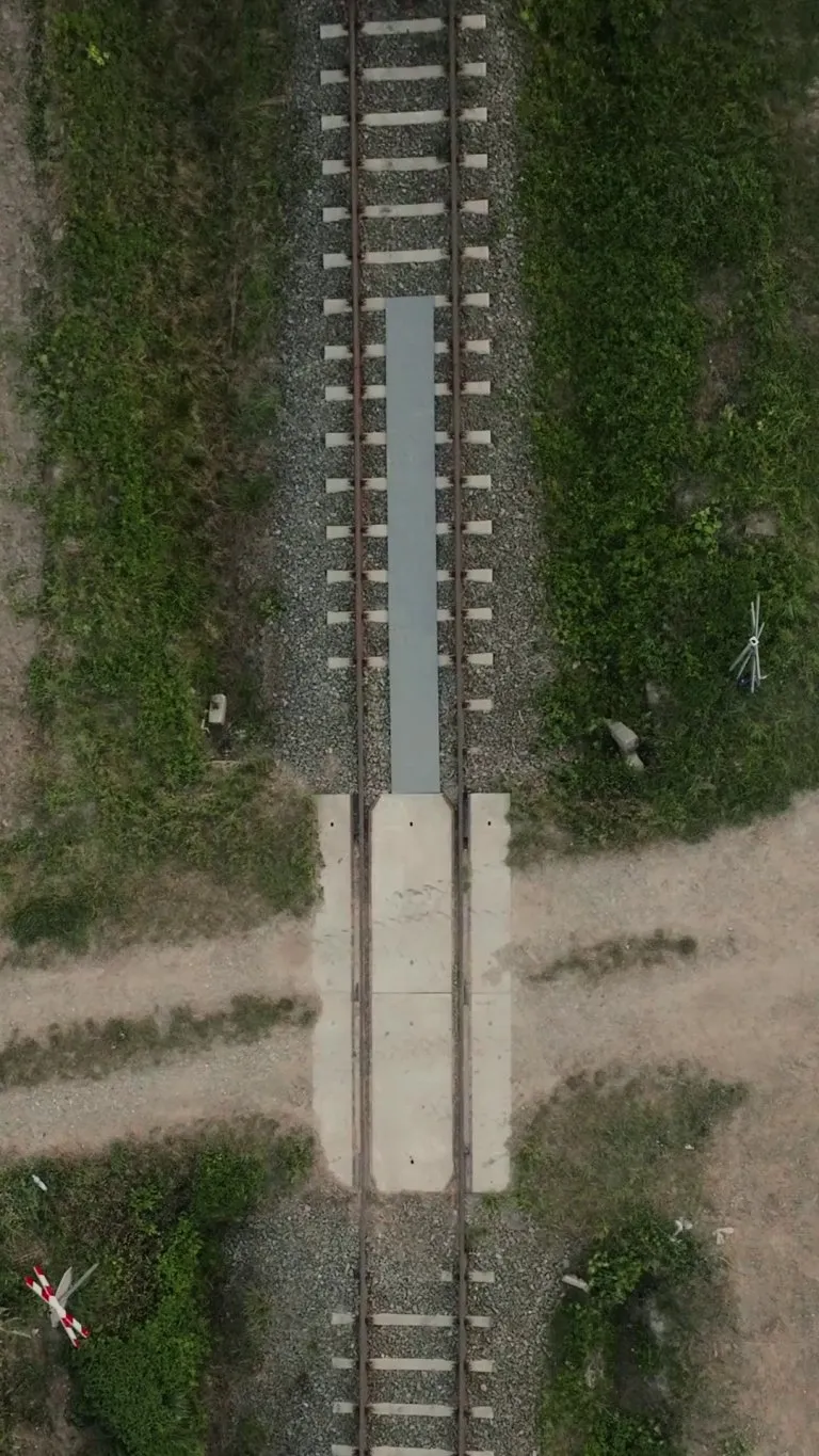 [Top-Down View] Dawid Godziek riding a bike on a moving train