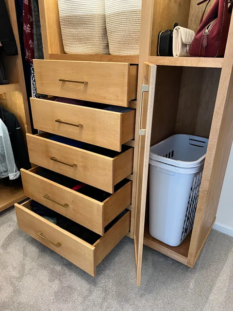 I made custom master closet built-ins with maple and maple plywood, LED lighting
