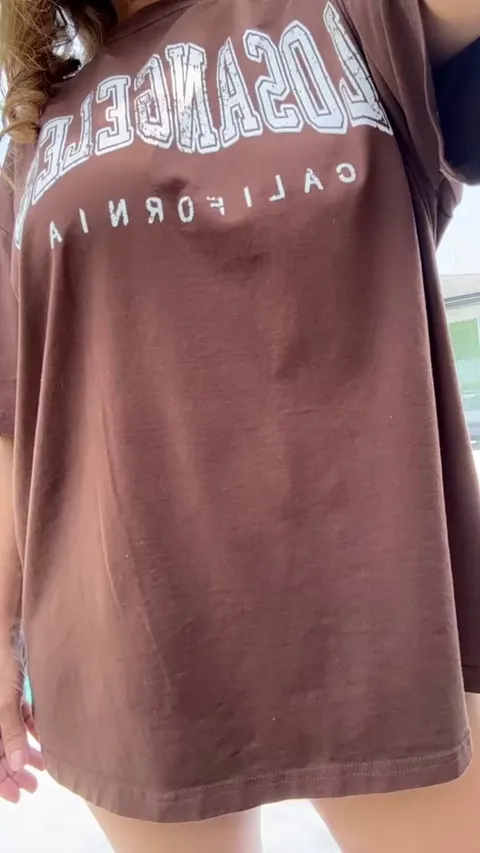 Revealing my perfectly sun kissed tits pool side!