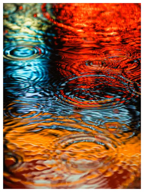 ITAP of neon lights reflected in a puddle