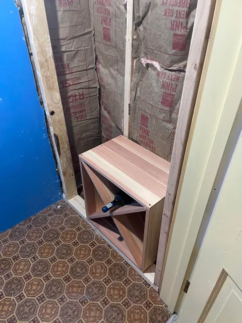 Built a wine closet under some stairs