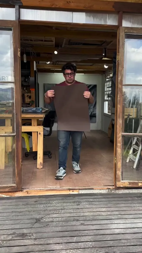 Paper folds turned into textured art with spray paint