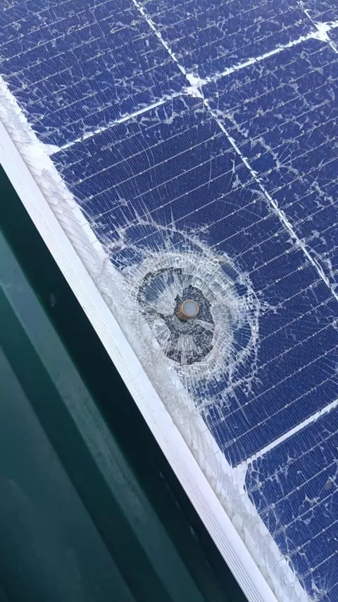 A solar panel on my roof was hit by a stray bullet.