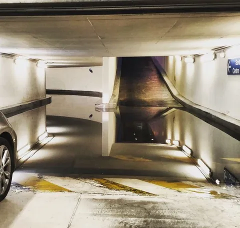 This surreal puddle in a parking garage