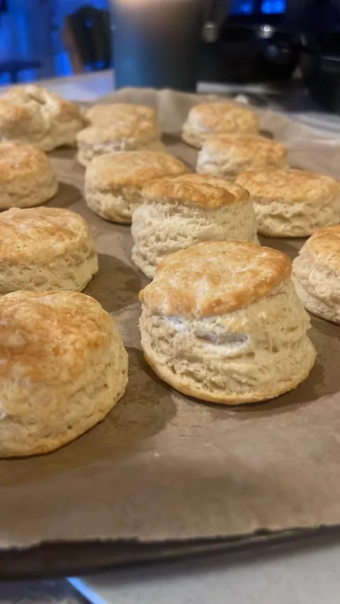 [homemade] buttermilk biscuits and gravy with sunny side up eggs and bacon