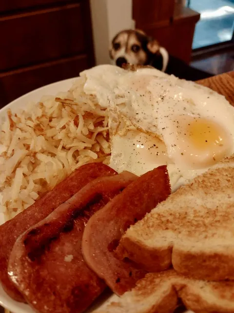 Spam, hash browns, eggs, and toast