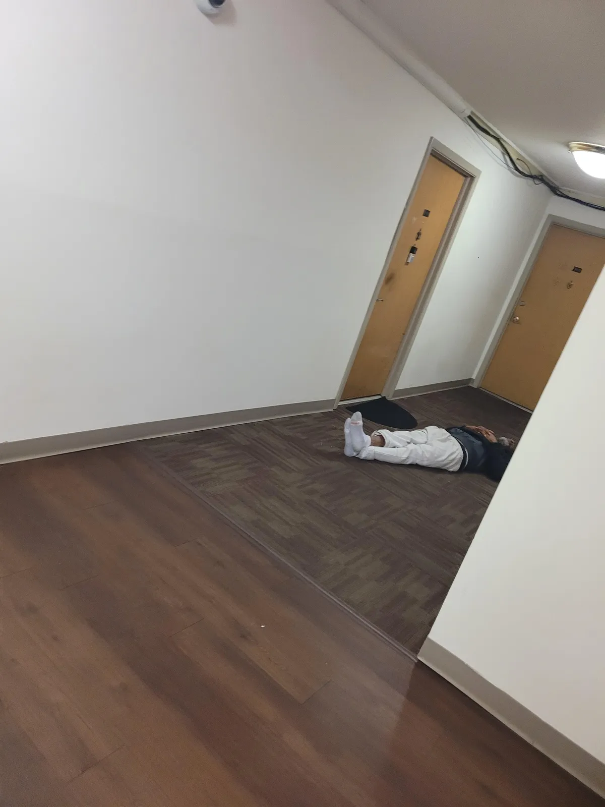 I go leave my apartment this morning at around 0530 and almost walk right into this guy sleeping in the hallway right outside my door.