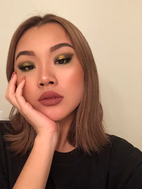 olive green smoky eye with pop of gold glitter ✨