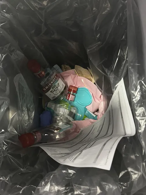 [OC] Smirnoff Vodka Bottles in My Dentist’s Patient Room Trash—WTF?!