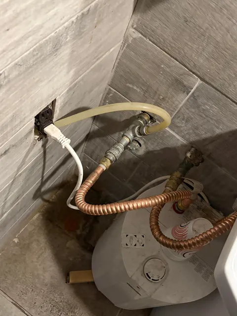 Water line running underneath the outlet and through the electrical box?? lol