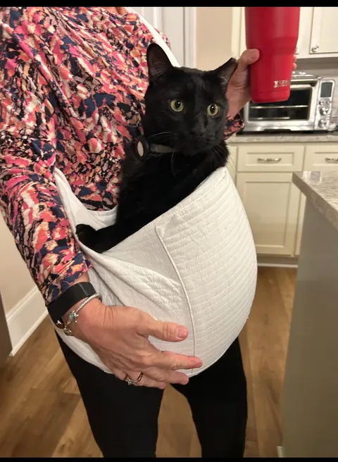 Mom with the cat she didn’t want