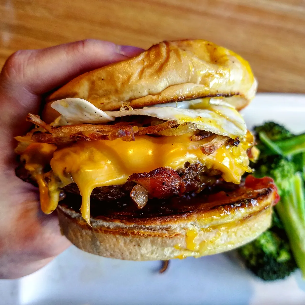 [I ate] a brunch burger with fried egg, hash brown, cheese, and bacon