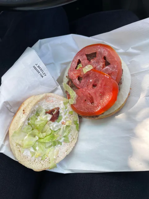 the bacon i paid an extra 50¢ for on my burger