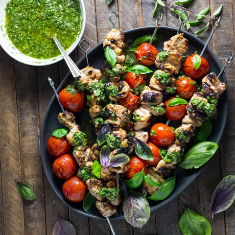 This is what I made with the last of our garden tomatoes and basil; Lemon-Garlic Chicken And Tomato Skewers With Basil Chimichurri
