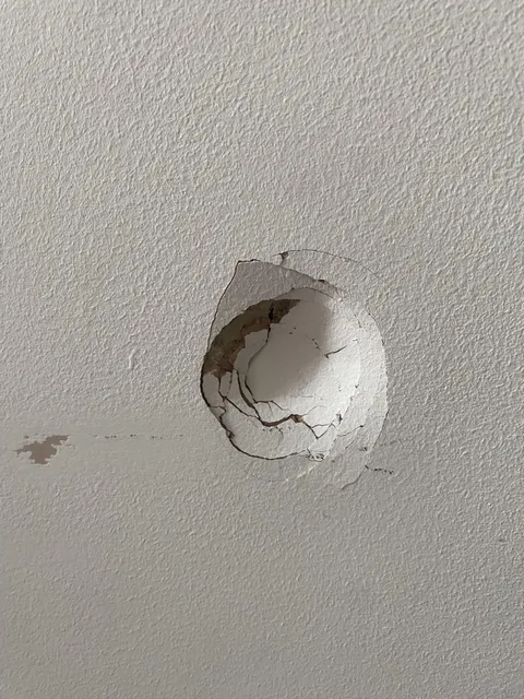 I tripped and punched a hole in the wall with my elbow