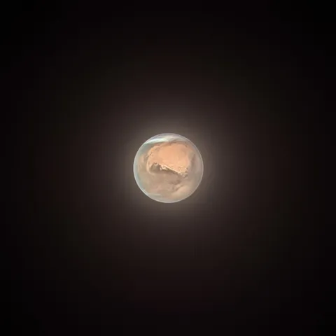 Mars is at its closest point to Earth right now. Here’s a picture I captured of it using a 14” telescope. On Wednesday I’ll be using the same telescope to capture it being occulted by the moon.