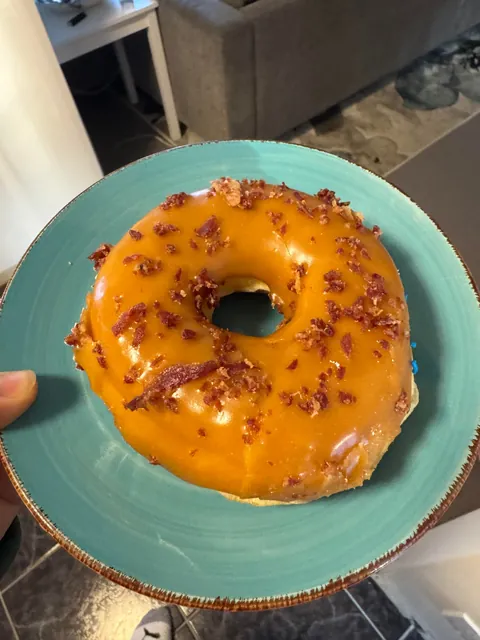 Ordered donuts at a very popular store near my house. The website photo has SO much more bacon than I received.