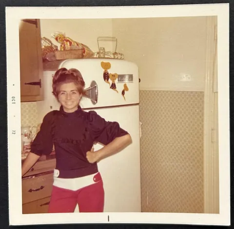 Young lady in her kitchen 1972