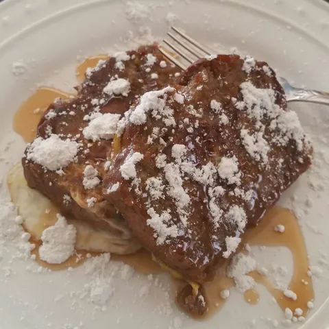 Recently learned how to make banana bread. Then had the idea to make french toast out of it. I haven't looked back since.