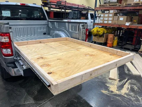 I built a custom bed slider for my new work truck.