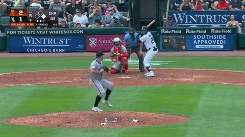 White Sox Chase Meidroth was able to avoid the tag attempt of Giants Brett Wisely. Was called out but later ruled safe after review