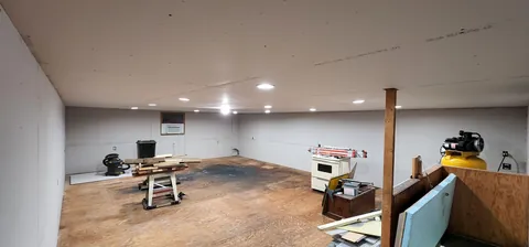 Finished the 2nd floor of my garage into a Home Theatre and Gym.