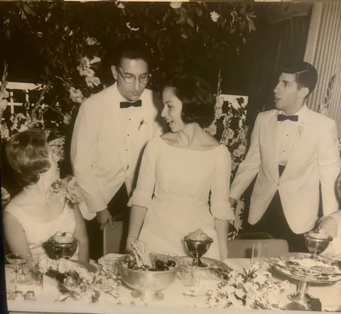 1964. My mom was a terrified girl from Brooklyn marrying into rich Chicago family. Bonus: twin flower girls!