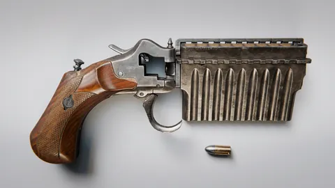 Before a rotating barrell, there was sliding chambers. Harmonica pistols. Photos of a mid 19th century model.